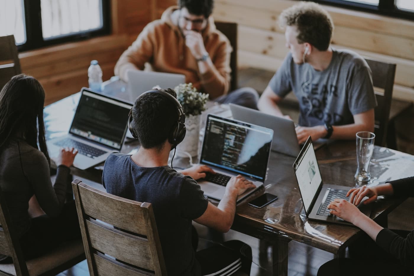 Team collaborating with AI tools